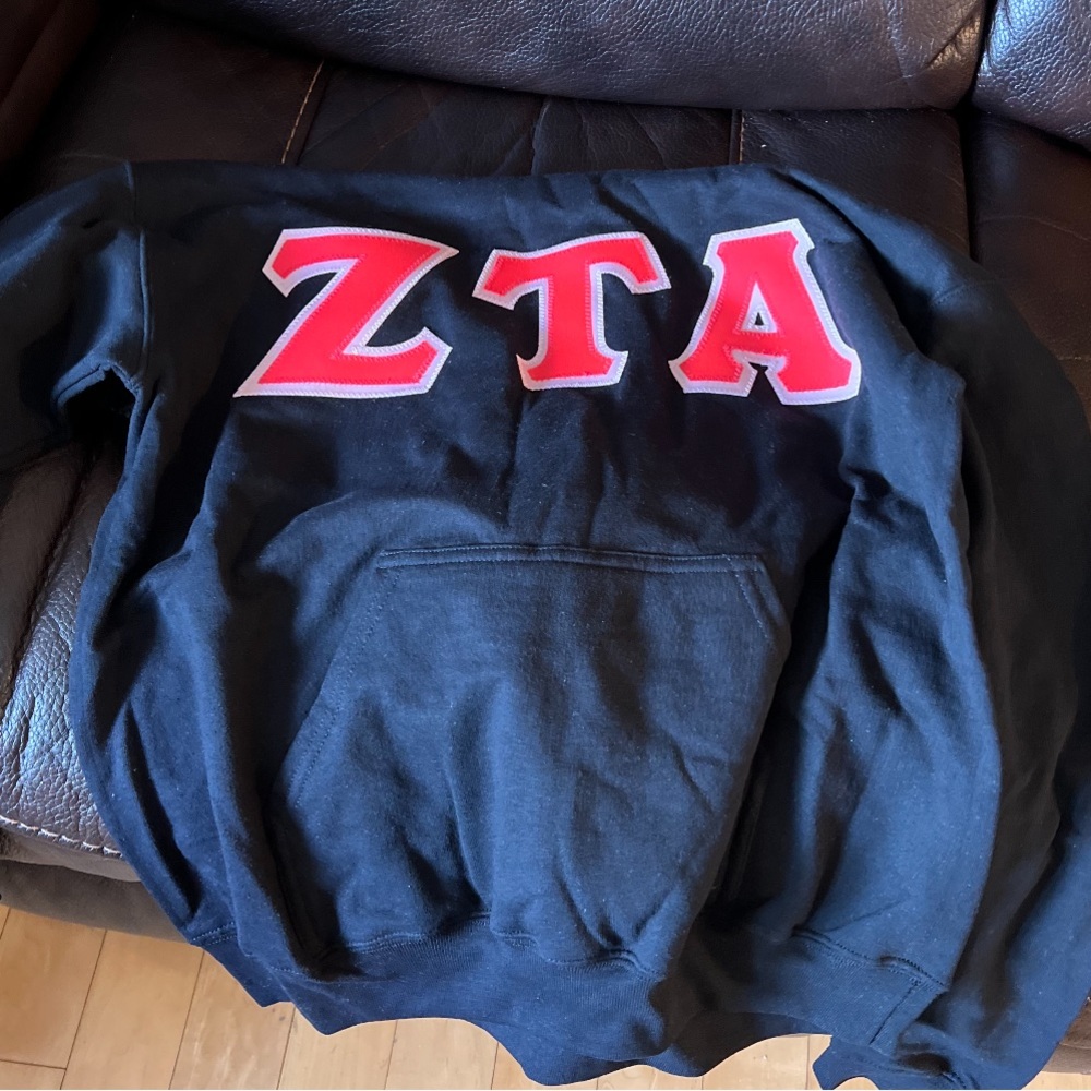 black and hot pink ZTA hoodie